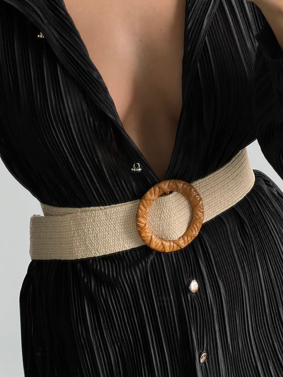 Pair a woven fabric sash belt with a maxi dress for a boho-chic summer look.